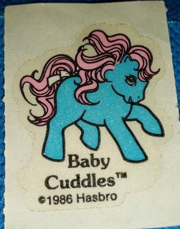 File:Baby Cuddles BBE sticker.jpg