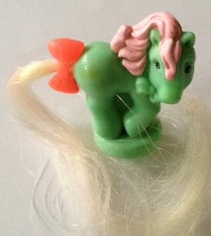 File:Petite stamp green pink.jpg