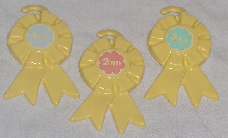 File:3 Yellow prize ribbons.JPG