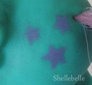 Purplehair-columbia-turquoise-baby-bluebelle-symbol.jpg