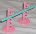 2 pink jump stands with a turquoise pole.JPG