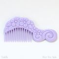 LittlePrettyLightPurpleComb.JPG